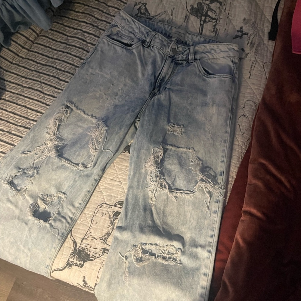Denim jeans with rips
